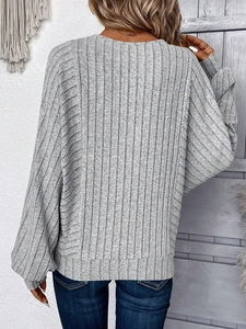 Women's light grey crew neck knit sweater with vertical ribbed texture and drop shoulder back view