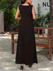 Elegant sleeveless black slim fit maxi dress with a flowy A-line skirt for summer