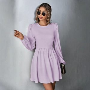 Close-up of light purple puff sleeve dress with a textured chiffon fabric detail