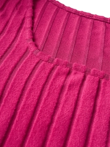 Close-up of hot pink ribbed knit fabric showing the detailed vertical texture and stitching