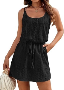 Detail of black crochet beach cover up dress showing lace texture and drawstring waist