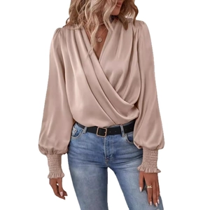 Elegant champagne satin blouse with V-neckline and lantern sleeves for professional wear