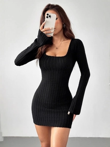 Slim fit black ribbed knit mini dress with deep U-neck and flared long sleeves