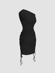 Detail of black one-shoulder knit dress showing textured ruching and side drawstring