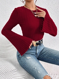 Women's deep red crew neck knit top with bell sleeves and ruffle trim in solid color