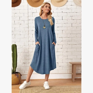 Women's autumn loose knit long sleeve dress with side pockets and curved hem in blue