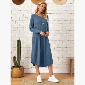 Detailed view of casual blue long sleeve knit dress with side pockets and curved hem