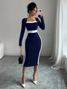 Detail of square neckline and contrast white waist stitching on the slim blue midi dress