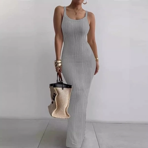 Detail of grey sleeveless maxi dress featuring vertical wavy texture and ribbed fabric
