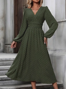 Elegant dark green Swiss dot maxi dress with V-neck, lantern sleeves and pleated waist