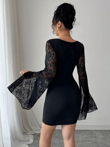 Elegant black fitted dress with lace flared sleeves and square neck in a rear view shot