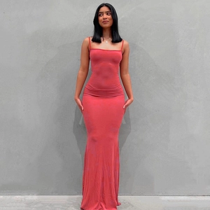 Detailed close-up of coral red slim fit maxi dress with thin straps and square neckline