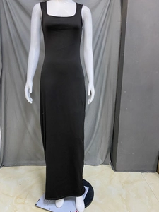 Detail of a black square neck sleeveless maxi dress showing slim fit cut and knit fabric