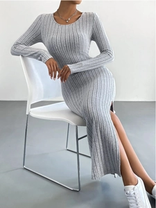 Detailed view of grey long sleeve knit dress with crew neck and stylish side slit
