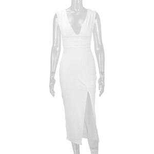 Detailed view of the elegant deep V-neck and ruched waist on this white slim-fit dress
