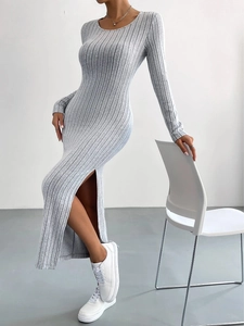 Close-up of side slit detail on long sleeve grey ribbed knit maxi dress for women