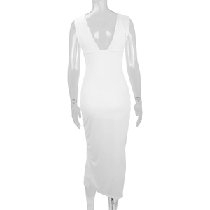 Detail view of the back of a slim-fit white dress with a deep V-neck and backless design