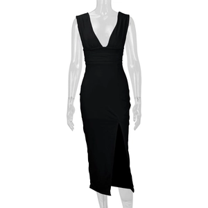 Detail of elegant black deep V-neck dress featuring high waist and side slit detail