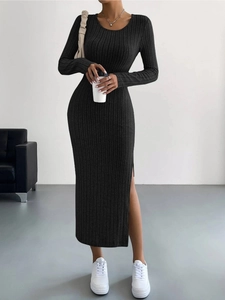 Detailed view of the rib-knit texture and side slit on this black long sleeve maxi dress