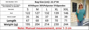 Size chart for women's loose round neck t-shirt with fabric composition and measurements