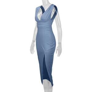 Detail of blue backless dress featuring a deep V-neck and high-slit thigh design