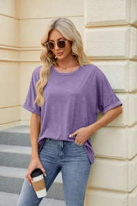 Detail of amethyst purple loose fit t-shirt featuring a classic crew neck and soft fabric