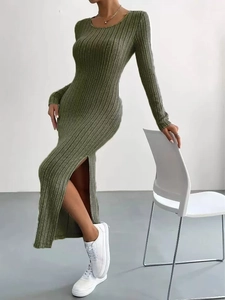 Detail shot of the olive green ribbed knit dress featuring side slit and soft texture