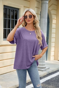 Detail of purple loose fit crewneck T-shirt with rolled cuffs and soft melange texture