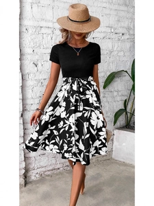 Short sleeve high waist dress featuring floral print skirt and black top with waist tie