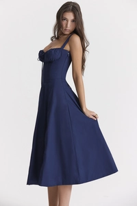 Detail view of navy blue corset midi dress with drawstring neckline and thin straps