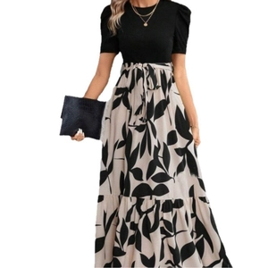 Elegant floral print maxi dress with black bodice and high-waist belt for summer style