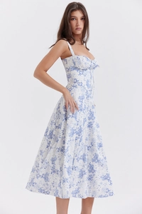 Detail of French vintage floral midi dress showing corset bodice and blue pattern