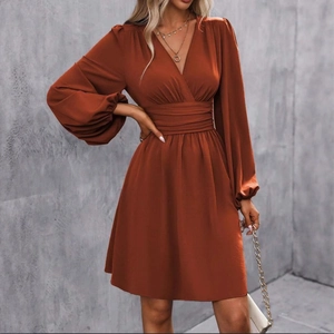Elegant caramel V-neck mini dress with lantern sleeves and a ruched waist design
