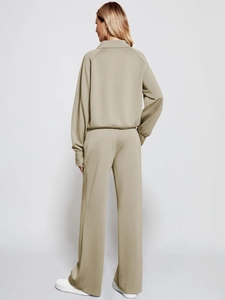 Rear view of khaki two-piece oversized half-zip sweatshirt and wide-leg sweatpants set
