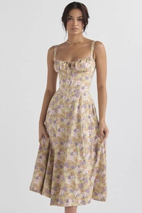 Detailed close-up of floral print and bustier bodice design on a summer midi dress