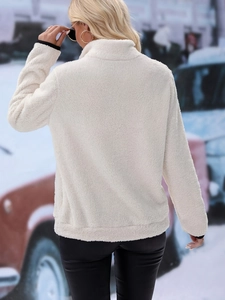 Women's cream fleece half-zip jacket with a relaxed fit shown from a back view outdoors