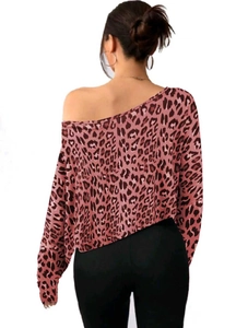 Back view of a loose off-shoulder crop top featuring pink and brown leopard print