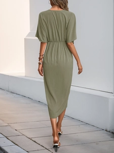 Rear view of an olive green midi dress with v-neck detail and an asymmetric hemline