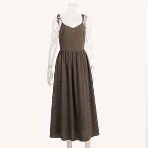 Detailed view of deep brown cotton V-neck dress with adjustable tie-up shoulder straps