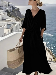 Elegant black V-neck maxi dress with waist knot detail and wide sleeves for summer vacation