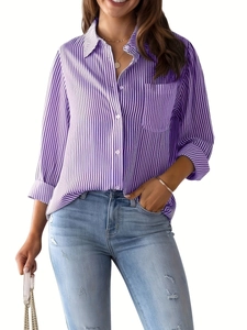 Detail view of purple vertical striped shirt with lapel collar and chest pocket