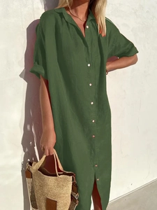 Detail of short-sleeved cotton linen shirt dress with button-up front in dark green