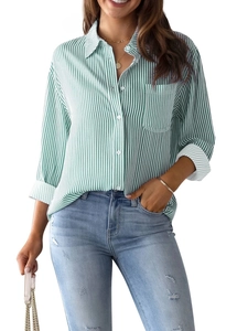 Detail view of women's casual long sleeve shirt featuring green and white vertical stripes