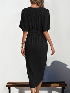Back view of a black short sleeve waist-slimming midi dress with pleated elastic waist
