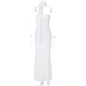 Detail of white strapless bodycon mermaid dress with matching shoulder shawl wrap