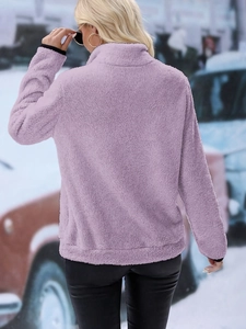Detailed back view of a lavender plush half-zip sweatshirt with black binding on the edges