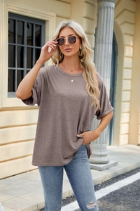 Close-up of a casual loose fit crew neck mauve t-shirt with trendy dropped shoulders