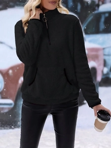 Detail of black plush half-zip fleece hoodie for women with kangaroo pocket and high collar