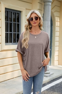 Detail of taupe loose-fit T-shirt with rolled cuffs and casual cotton blend texture