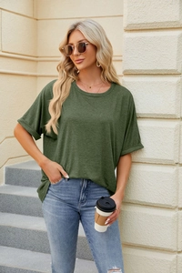 Close-up of rolled cuff detail on dark green loose crew neck t-shirt for women